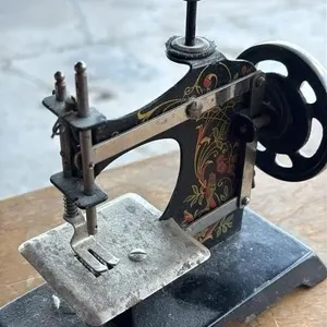 Antique Tin Sewing Machine Toy