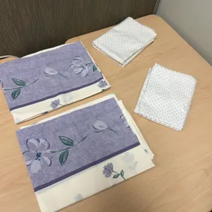 Four Pillowcases With Floral and Polka Dot Patterns in Lavender and White Cotton Blend Fabric