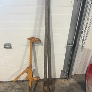 Post hole digger and fence stretcher