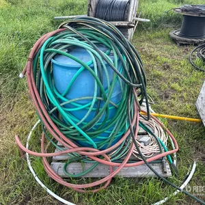 Quantity of Hoses and 50 gal Container