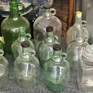 Various Glass Jars and Gallon Jugs with Rubber Corks