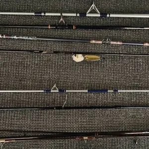 Fishing Rod and Life Jacket Lot Including Ugly Stik, Mitchell, Major Rod, and Buoy O' Boy