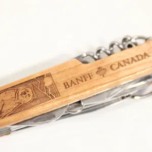 CARVED WOOD POCKET KNIFE, BANFF, CANADA
