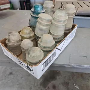 Box of assorted glass insulators.