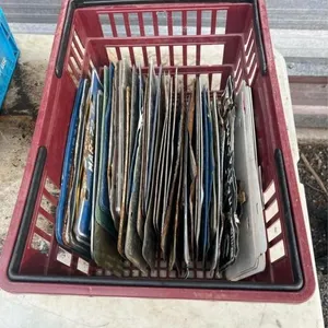 Basket of vintage license plates