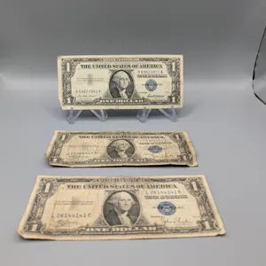 Three $1 United States Silver Certificates: 1957 and 1935 C Series