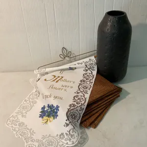 Decorative Vase, Woven Placemats, and Embroidered Wall Hanging Set