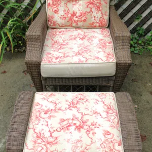 Wicker Armchair and Ottoman Set with Floral Cushions