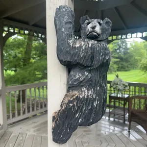 Large chainsaw bear- climbing