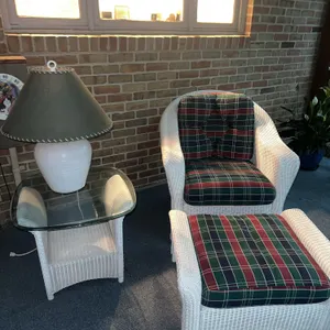 High-quality wicker chair with ottoman and end table
