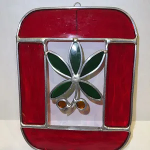 Stained glass Block O with Buckeye leaf