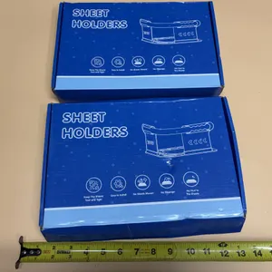 (2) Sheet holders with lock strips, designed to grip mattress corners and prevent fitted sheets from