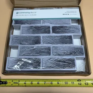 Commomy 3D Peel And Stick Wall Tiles featuring a textured, faux gray brick design. (10 Pieces & New)