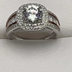 $1,575.00 - 2.00 CT GRA CERTIFIED ROUND BRILLIANT CUT MOISSANITE ROUND HALO IN SHANKS SET IN 925 SIL