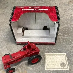 Farmall A Tracor die cast with authenticity cert.