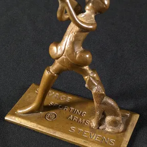 BRASS OR BRONZE ADVERTISING COUNTERTOP SIGN PAPER WEIGHT STEVENS SAVAGE SPORTING ARMS
