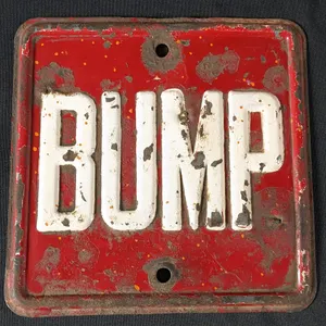 SMALL EMBOSSED STEEL BUMP ROAD SIGN