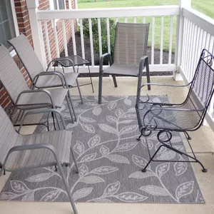 8pc Modern Patio Furniture Set – 4 Sling Chairs, 2 Mesh Side Tables, Wrought Iron Rocker & Carpet