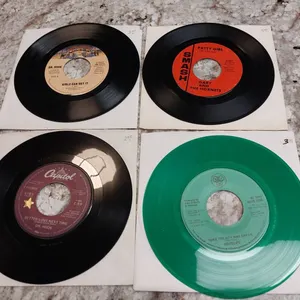 4 Assorted 7-Inch 45 RPM Records Featuring Dr. Hook, Gary and the Hornets, and Horslips, With Green