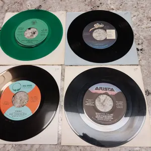 Four 7-Inch Vinyl Singles: Horslips Green Vinyl, Whitney Houston, Hot Chocolate, James House