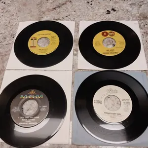 4 Assorted 45 RPM Records: The Honeydrippers, Brenda Holloway, Heart, Herman’s Hermits