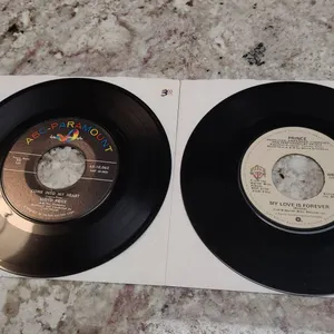 Two 7-Inch 45 RPM Singles: Lloyd Price 'Come Into My Heart / Won'tcha Come Home' and Prince 'My Love