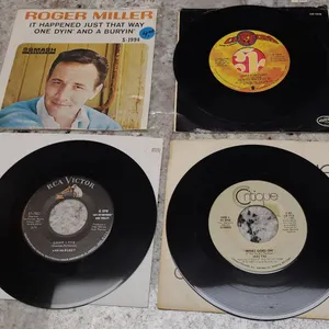 Four 7-Inch 45 RPM Records Featuring Roger Miller, Curtis Mayfield, Mai Tai, and Ann-Margret