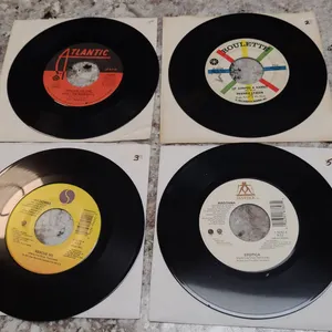 Four 7-Inch Vinyl Singles Featuring Madonna, Mike + The Mechanics, and Frankie Lymon Releases