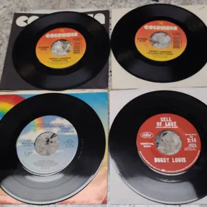 Four 7-Inch 45 RPM Records: Kenny Loggins, Bobby Louis, and Loose Ends (Mixed Labels, Sleeves) Colle