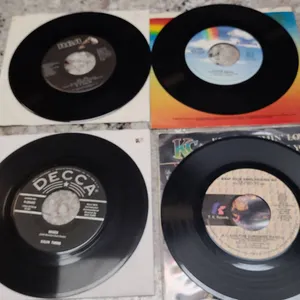 Six 7-Inch 45 RPM Records Featuring Elton John, K.T. Oslin, KC and the Sunshine Band, Kalin Twins