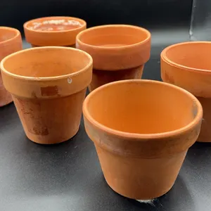 6 Small Clay Pots