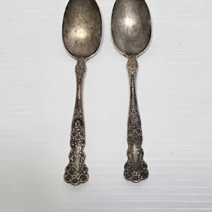 An Ornate, Matched Pair of Antique Sterling Silver Spoons. 21.8g Each Total 43.5g Total. LR