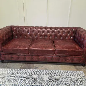 Brown tufted Chesterfield-Style Three-Seat Sofa
 UNRESERVED