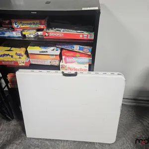 Assorted Board Games and Folding Table
 UNRESERVED