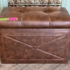 Brown faux-leather tufted lift-top storage ottoman