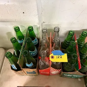 3 six packs of bottles with carriers