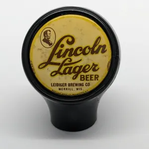 BALL TAP KNOB HANDLE LINCOLN LAGER BEER LEIDIGER BREWING MERRILL WISCONSIN (BASTIAN BROS)