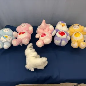 Care Bear stuffed animals and rabbit stuffed animal