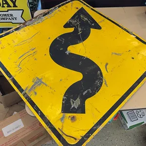 Curvy road sign