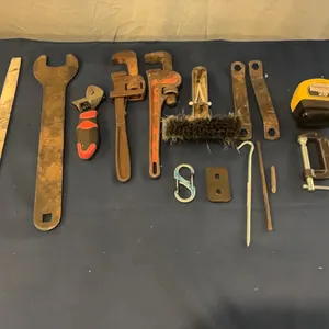 Wrenches, brush, and tape measure