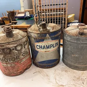 3 oil cans