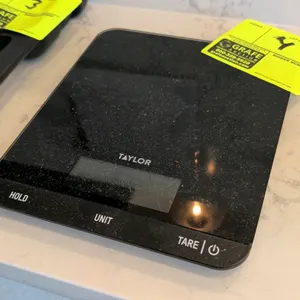 Taylor 5301335 33 lb digital portion scale. Features digital LCD display with hold, unit, and tare functions. Battery operated.