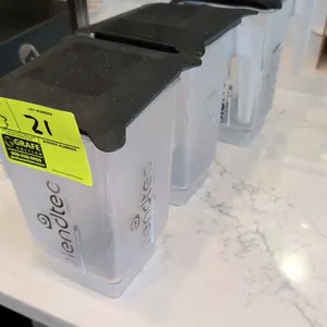 Blendtec WildSide+ commercial blender jars. Features clear construction with graduated measurement markings in ounces and cups. Includes black flexibl