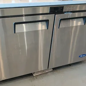 2022 Atosa MGF8402GR 2-door undercounter refrigerator. Stainless steel exterior and interior construction. Features recessed handles and adjustable wi