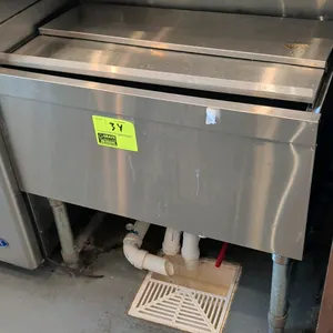 Stainless steel ice well. Features a sliding stainless steel cover and center drain. 30"W. Mounted on tubular legs with adjustable bullet feet. Conten