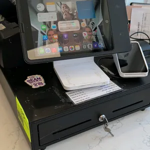 POS system hardware bundle. Includes touchscreen tablet in countertop stand, card reader, locking cash drawer with key, Star TSP100III receipt printer