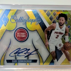 A 2023-24 Panini Phoenix Basketball Cade Cunningham Calligraphy Autograph Card. (Panini, 2023-24) Card No. CG-CCH featuring Detroit Pistons guard Cade