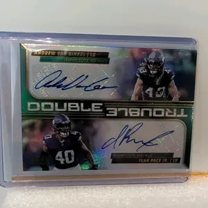 A 2025 Panini Score "Double Trouble" Dual Autograph Card. (Panini, 2025) A Panini Score Football "Double Trouble" trading card signed in blue ink by M
