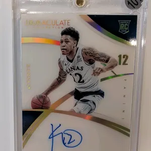 A Kelly Oubre Autographed Rookie Card. (Panini, 2015) A 2015 Panini Immaculate Collection Multi-Sport rookie card, No. 348, featuring Kelly Oubre in h