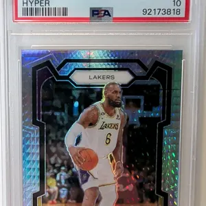 A 2023-24 Panini Prizm LeBron James #63 Hyper Prizm Basketball Card. (Panini, 2023-24) Depicting LeBron James with the Los Angeles Lakers. Graded PSA 